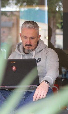 Adam working in a quiet space